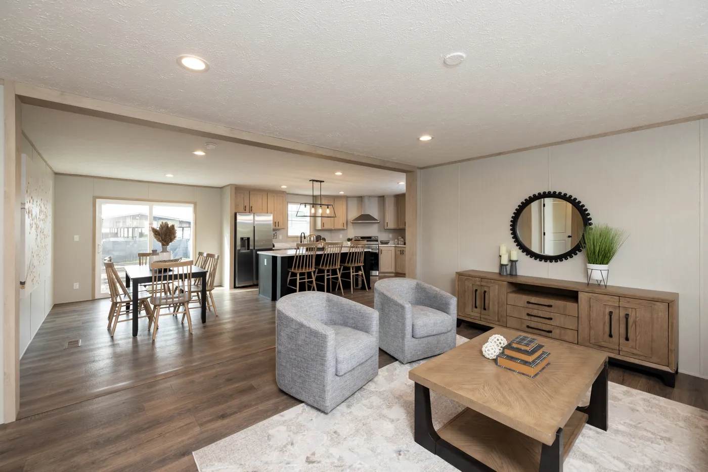 The VISION Living Room. This Manufactured Mobile Home features 4 bedrooms and 2 baths.
