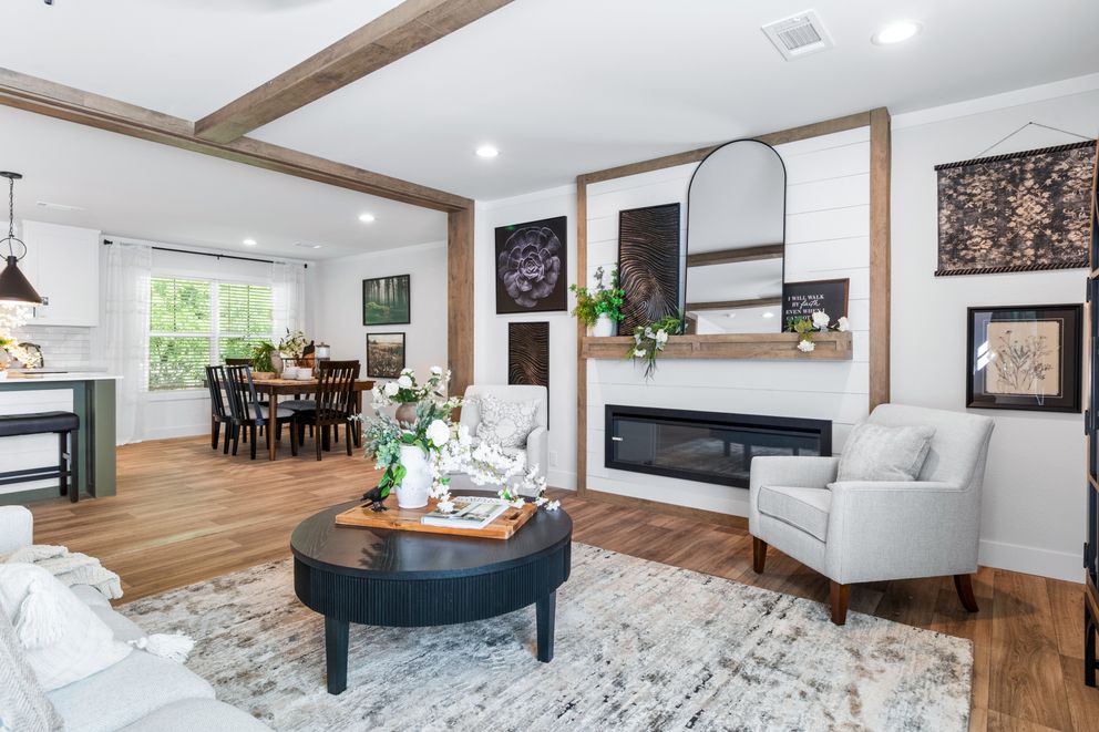 The FARM 4 FLEX ELITE Living Room. This Manufactured Mobile Home features 4 bedrooms and 3 baths.