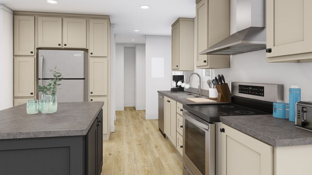 The RISING SUN Kitchen. This Manufactured Mobile Home features 2 bedrooms and 2 baths.