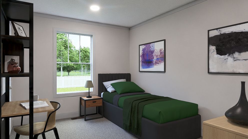 The STAYIN' ALIVE Guest Bedroom. This Manufactured Mobile Home features 3 bedrooms and 2 baths.