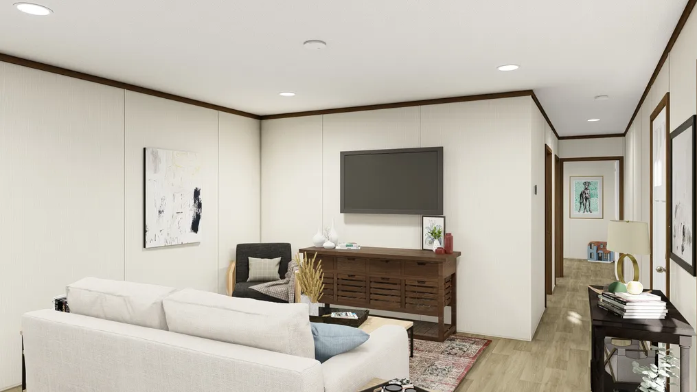 The THE DESIRE Living Room. This Manufactured Mobile Home features 3 bedrooms and 2 baths.