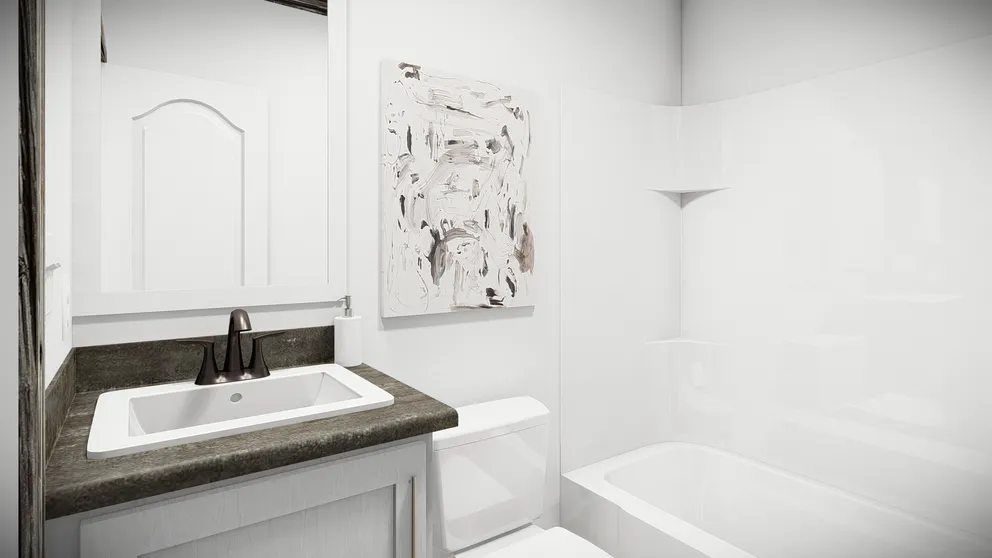 The THE BANDIT Primary Bathroom. This Manufactured Mobile Home features 3 bedrooms and 2 baths.