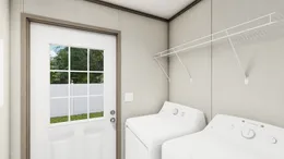 The LEGEND BIG BOY Utility Room. This Manufactured Mobile Home features 4 bedrooms and 2 baths.