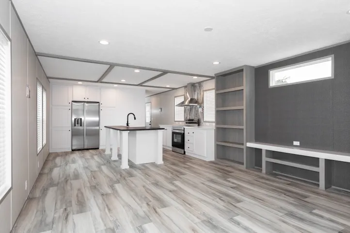 The PLATINUM ANNIVERSARY Living Room. This Manufactured Mobile Home features 3 bedrooms and 2 baths.