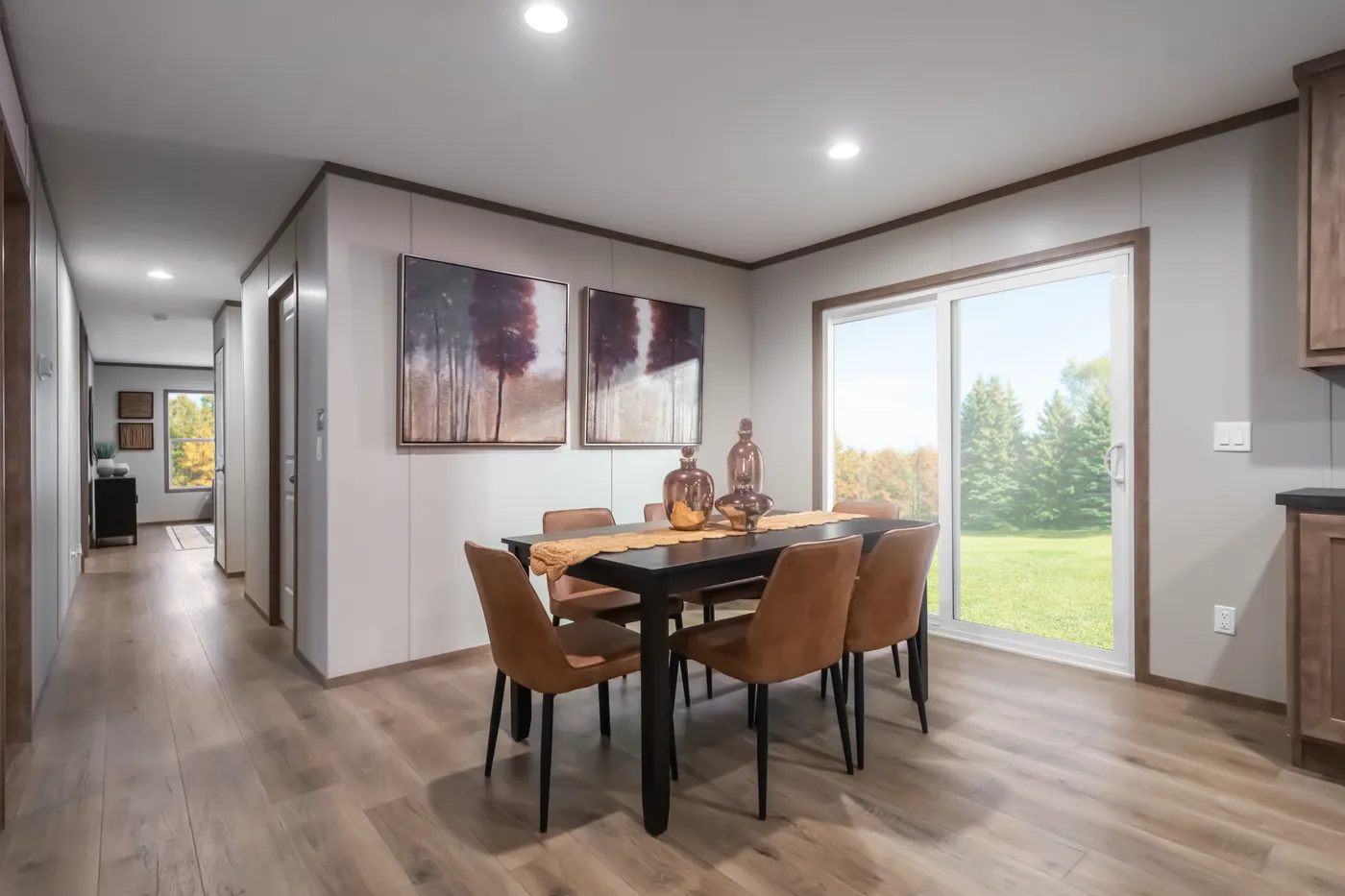 The SEVIER Dining Area. This Manufactured Mobile Home features 4 bedrooms and 3 baths.