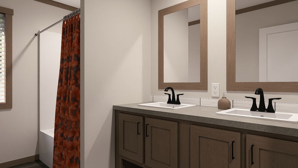 The EMILIE ELITE Guest Bathroom. This Manufactured Mobile Home features 3 bedrooms and 2 baths.