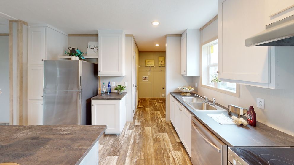The HANCOCK Kitchen. This Manufactured Mobile Home features 4 bedrooms and 2 baths.