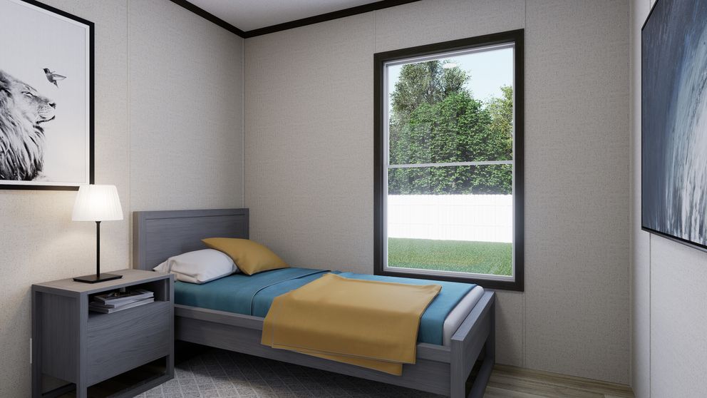 The THE SPARK Bedroom. This Manufactured Mobile Home features 3 bedrooms and 2 baths.