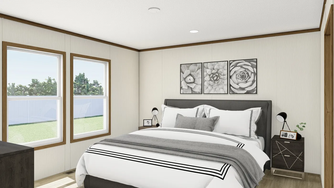 The REVEAL Primary Bedroom. This Manufactured Mobile Home features 3 bedrooms and 2 baths.