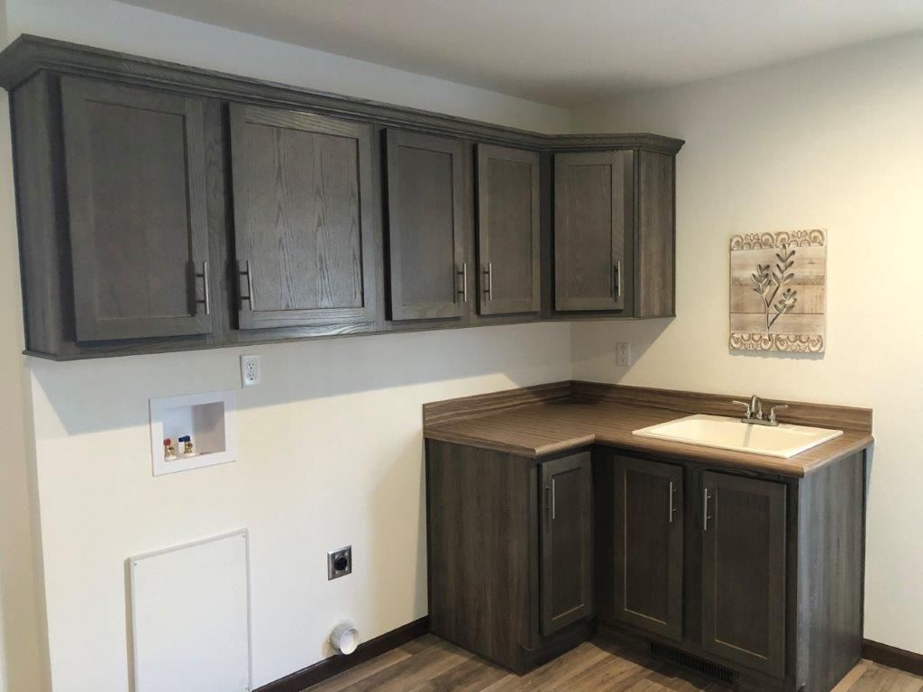 The LEGACY 572 MOD Utility Room. This Modular Home features 3 bedrooms and 2 baths.