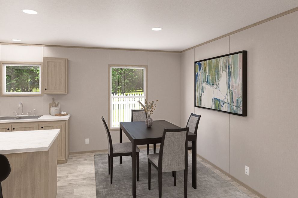 The THE EAGLE 68 Dining Room. This Manufactured Mobile Home features 4 bedrooms and 2 baths.