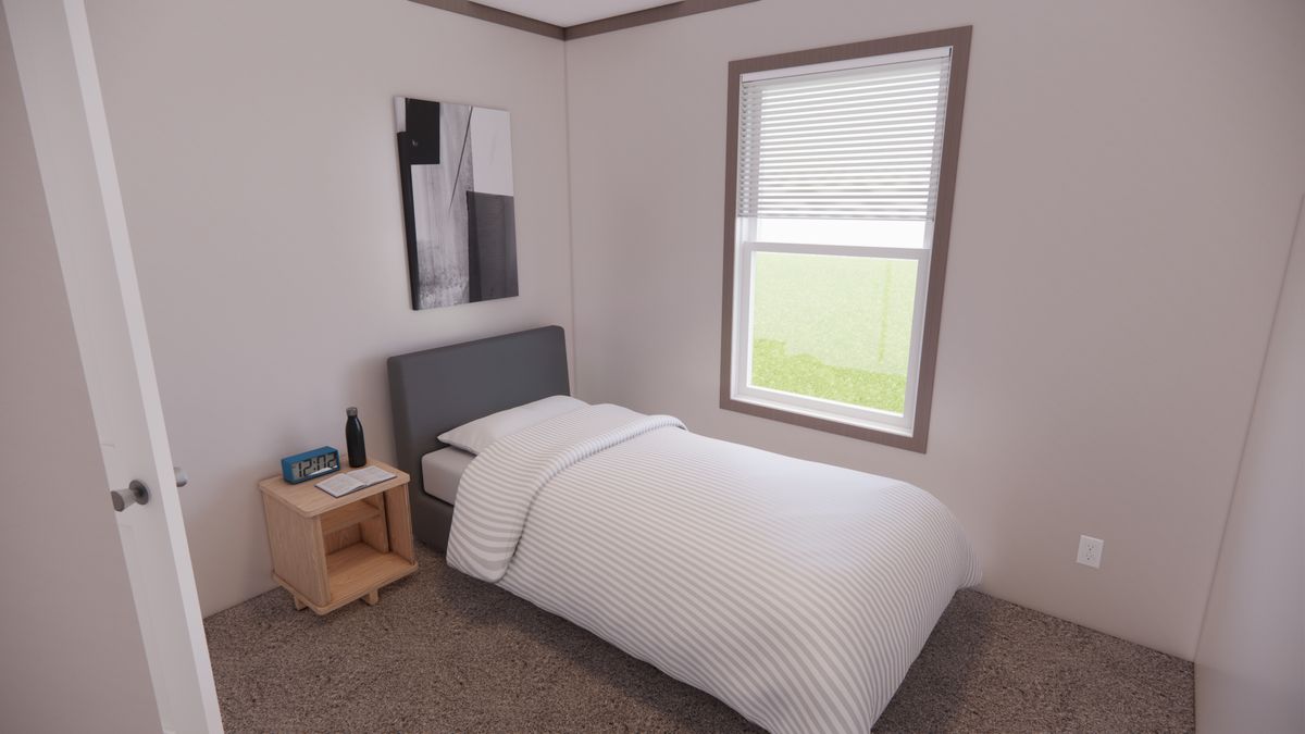 The 7216-4200 ADRENALINE Guest Bedroom. This Manufactured Mobile Home features 3 bedrooms and 2 baths.