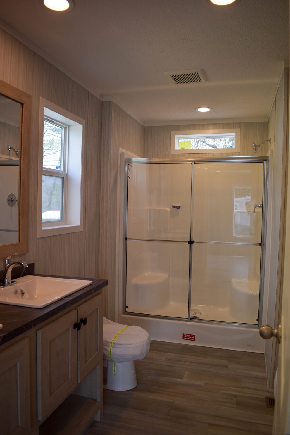 The MOONSTONE 60 Guest Bathroom. This Manufactured Mobile Home features 3 bedrooms and 2 baths.
