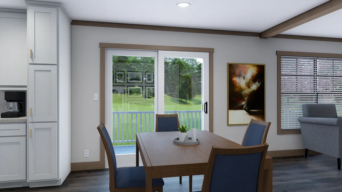 The ISABELLA Dining Room. This Manufactured Mobile Home features 3 bedrooms and 2 baths.