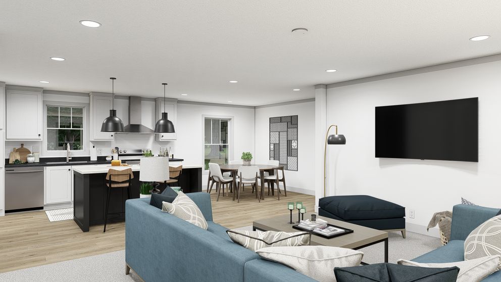 The WONDERFUL WORLD Living Room. This Manufactured Mobile Home features 3 bedrooms and 2 baths.