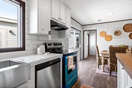 The THE REAL DEAL Kitchen. This Manufactured Mobile Home features 3 bedrooms and 2 baths.