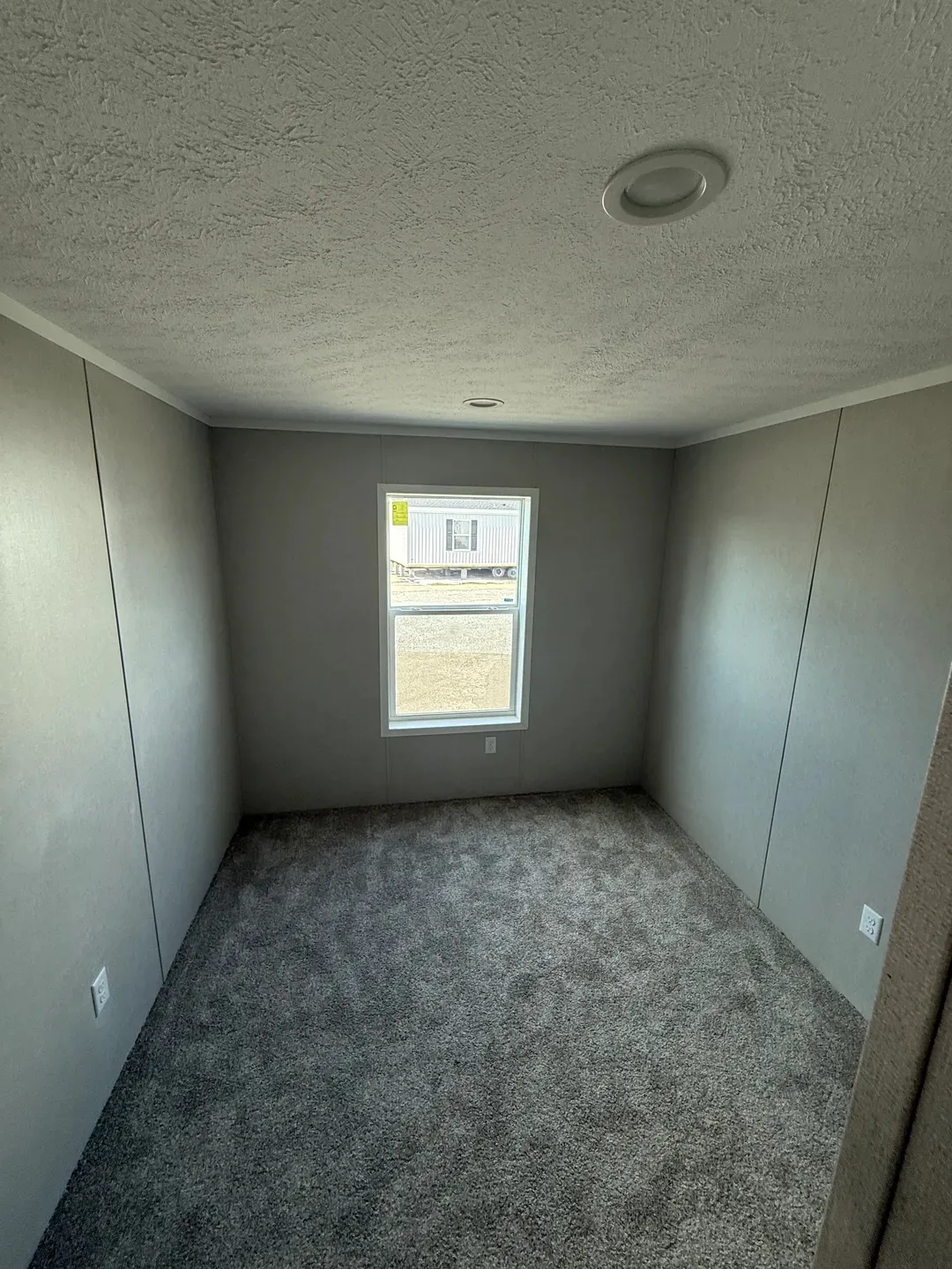 The ONYX Primary Bedroom. This Manufactured Mobile Home features 1 bedroom and 1 bath.