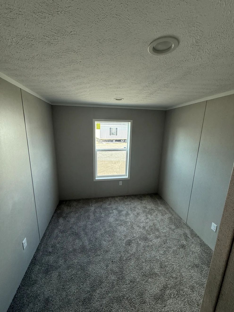 The ONYX Primary Bedroom. This Manufactured Mobile Home features 1 bedroom and 1 bath.