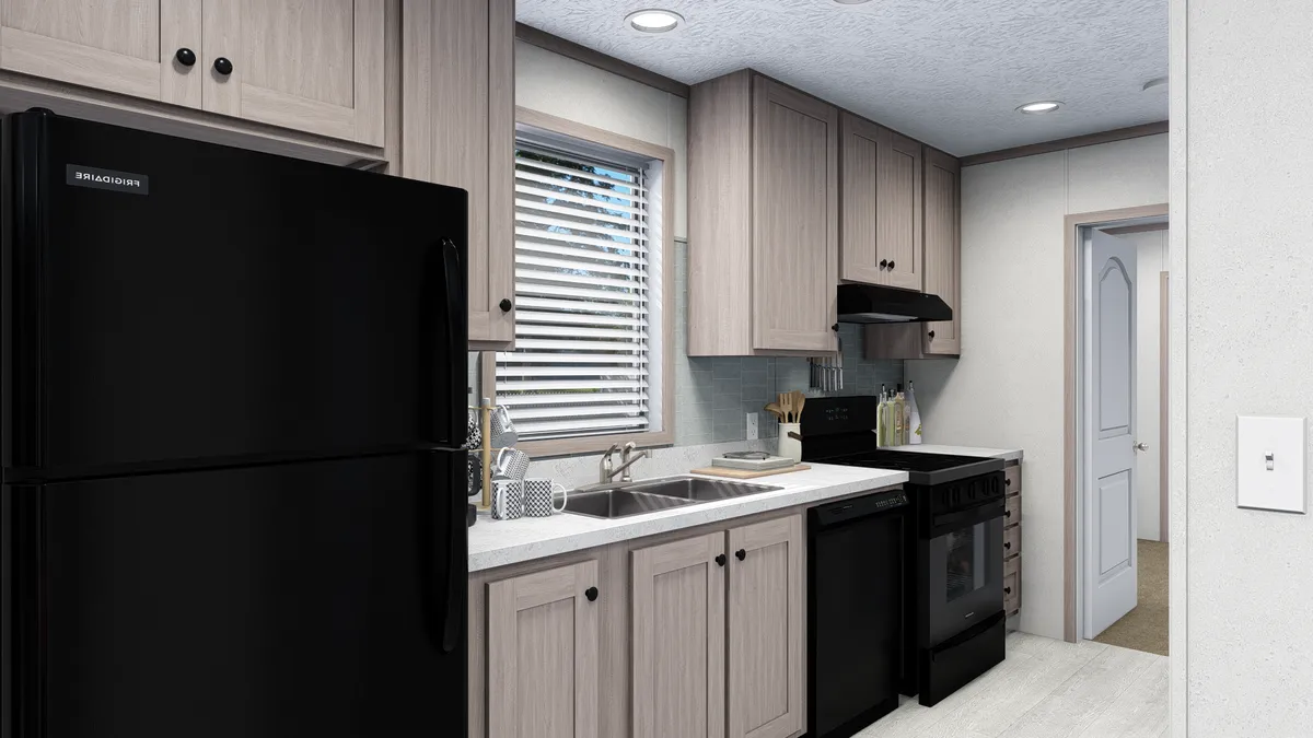 The 5614-4701 THE PULSE Kitchen. This Manufactured Mobile Home features 2 bedrooms and 1 bath.