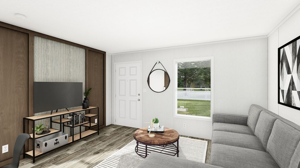 The PERIDOT 56 Living Room. This Manufactured Mobile Home features 2 bedrooms and 2 baths.
