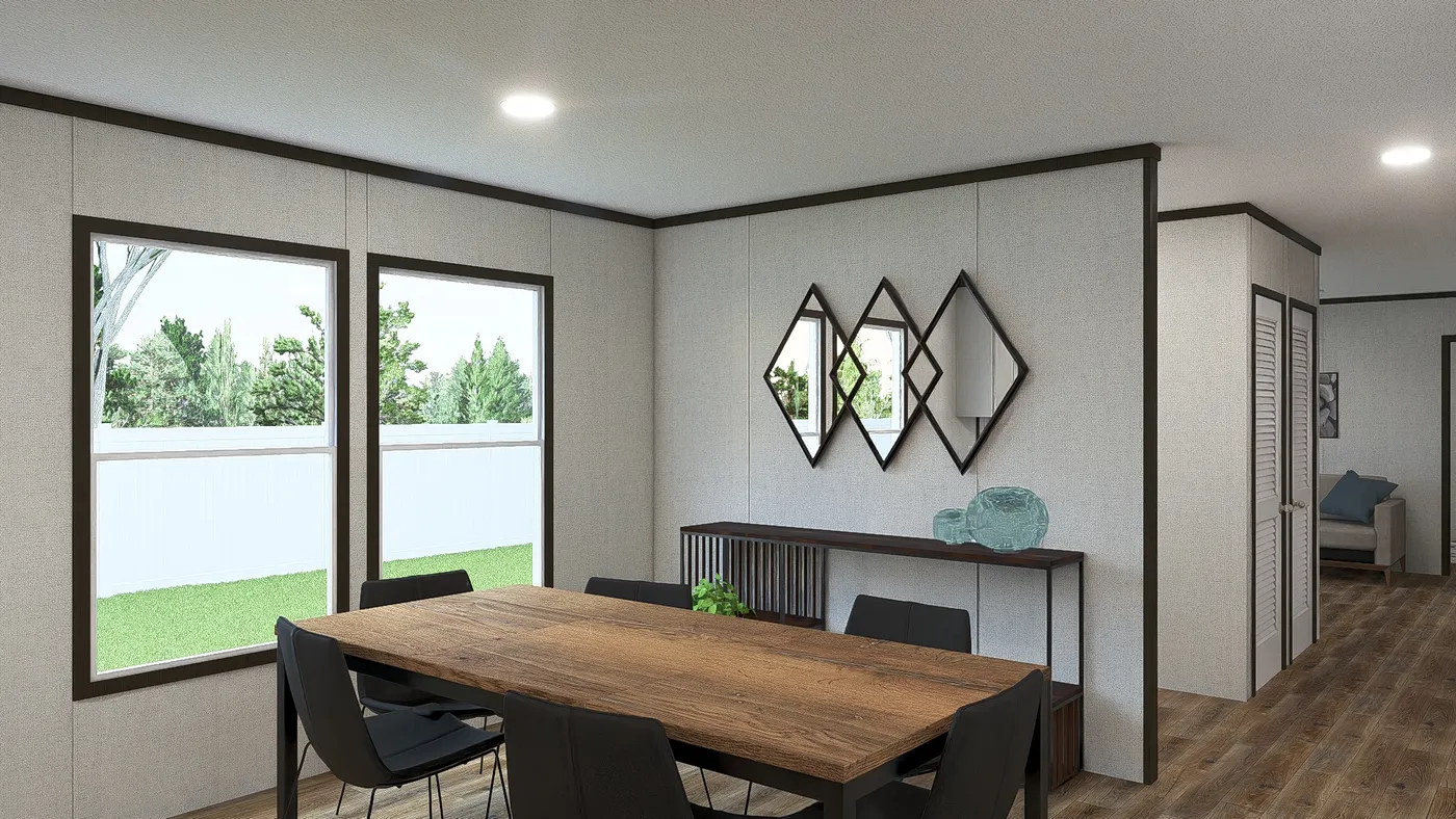 The AMBITION Dining Area. This Manufactured Mobile Home features 4 bedrooms and 2 baths.