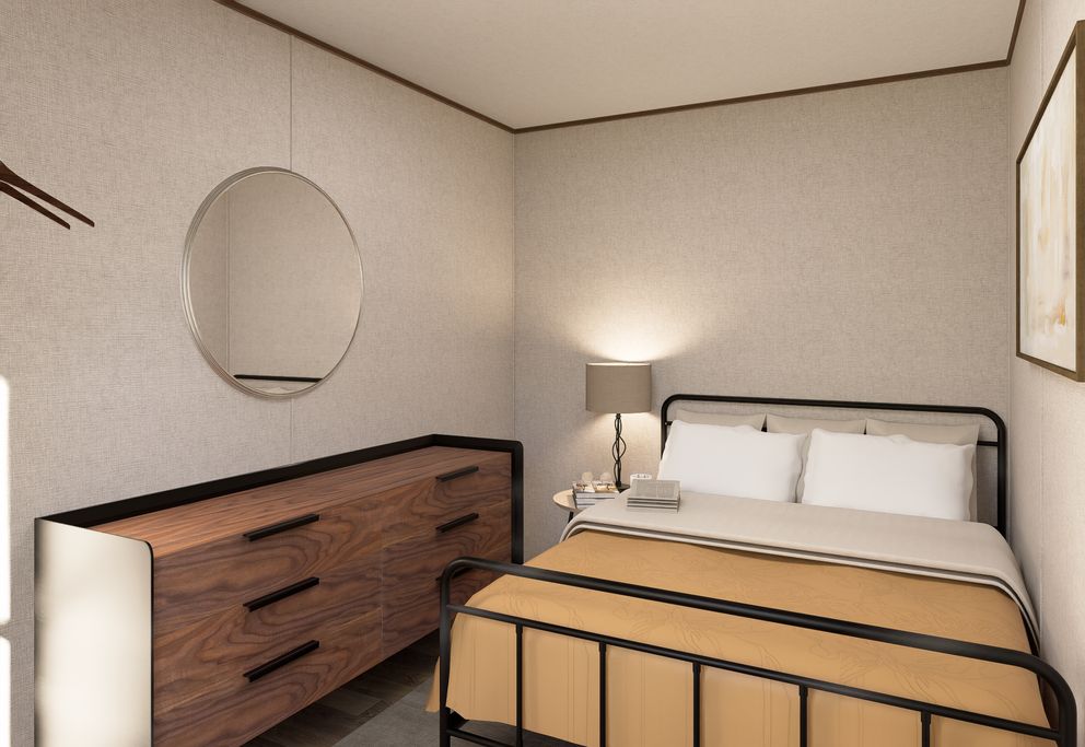 The BUTTERCUP Primary Bedroom. This Manufactured Mobile Home features 1 bedroom and 1 bath.