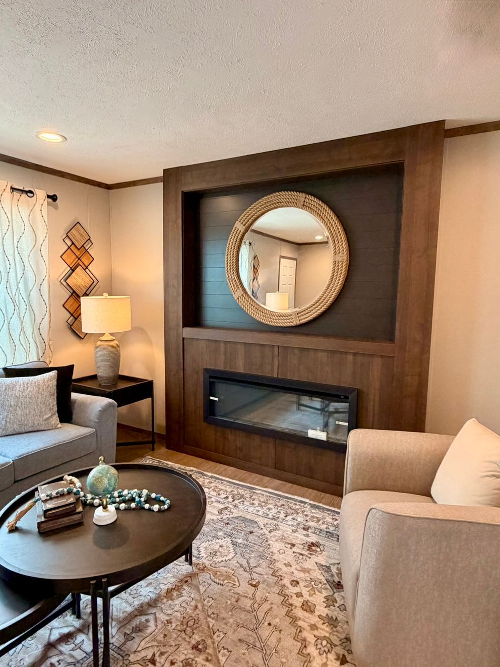 The APATITE Living Room. This Manufactured Mobile Home features 3 bedrooms and 2 baths.