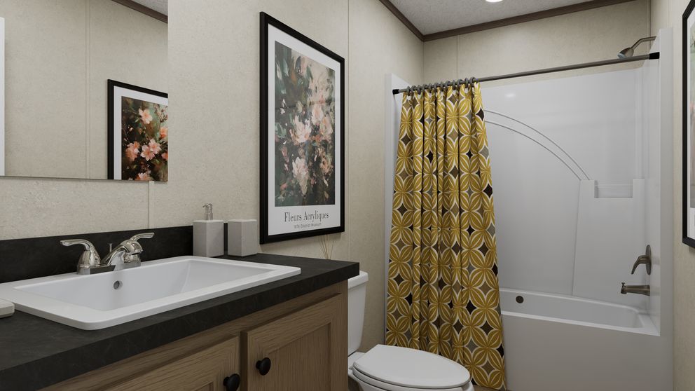 The 5216-CC05 OASIS 52 Primary Bathroom. This Manufactured Mobile Home features 2 bedrooms and 1 bath.