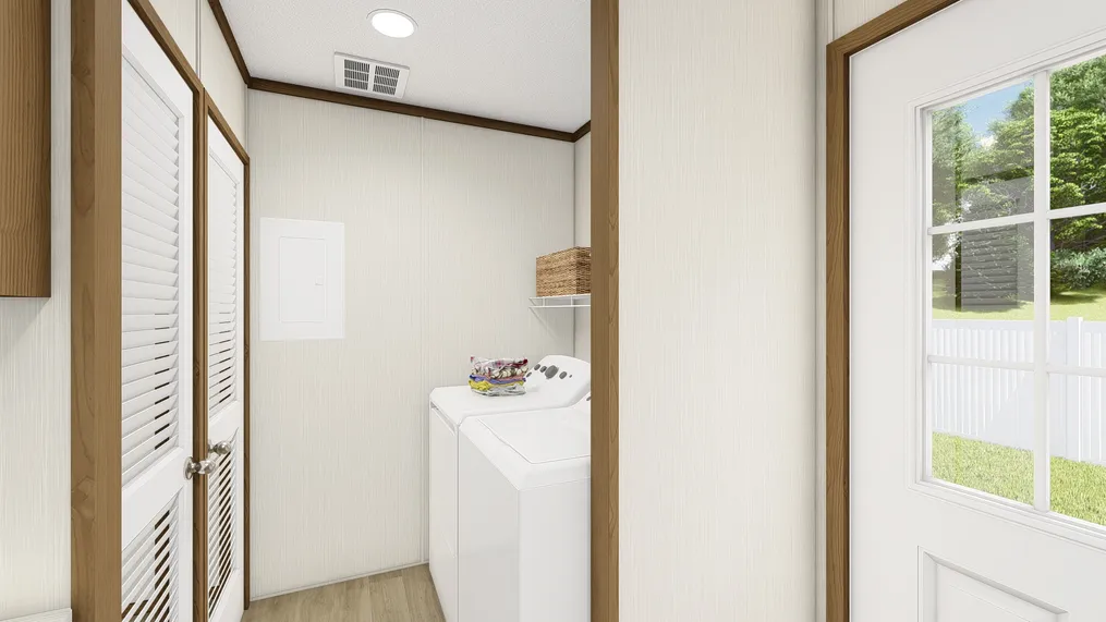 The DYNAMIC Utility Room. This Manufactured Mobile Home features 3 bedrooms and 2 baths.