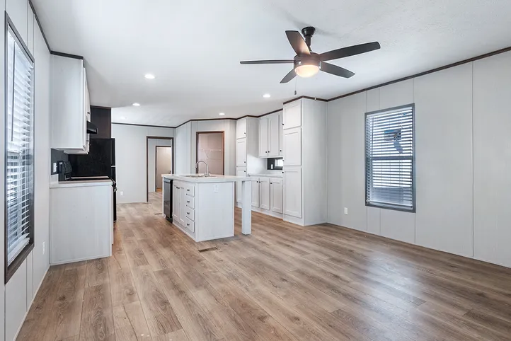 The SELECT 16723B Living Room. This Manufactured Mobile Home features 3 bedrooms and 2 baths.