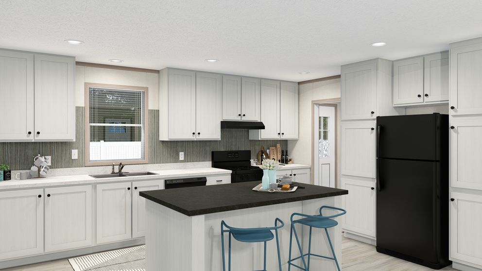 The 4428-E781 THE PULSE Kitchen. This Manufactured Mobile Home features 3 bedrooms and 2 baths.