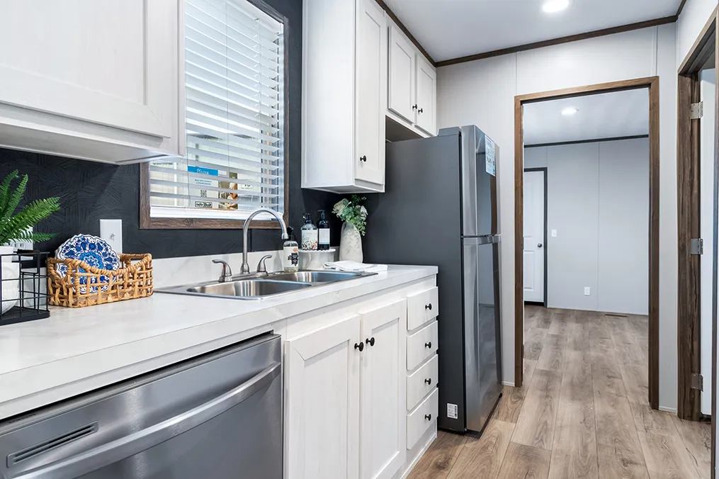 The SELECT 16723A Kitchen. This Manufactured Mobile Home features 3 bedrooms and 2 baths.