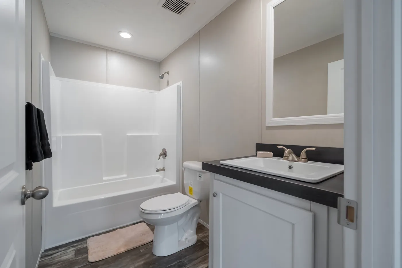 The NORTHSHORE Guest Bathroom. This Manufactured Mobile Home features 3 bedrooms and 2 baths.