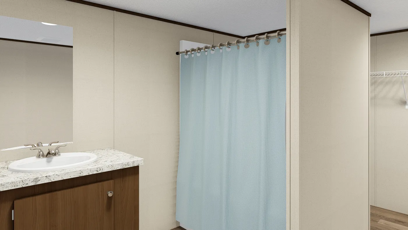 The EXCITEMENT Primary Bathroom. This Manufactured Mobile Home features 3 bedrooms and 2 baths.