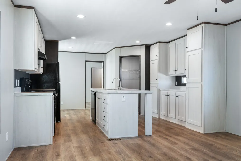 The SELECT 16722S Kitchen. This Manufactured Mobile Home features 2 bedrooms and 2 baths.