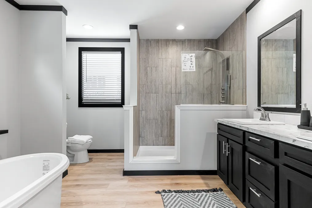 The THE MAUI Primary Bathroom. This Manufactured Mobile Home features 3 bedrooms and 2 baths.