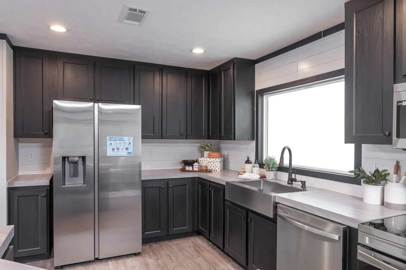 The CRAZY EIGHTS Kitchen. This Manufactured Mobile Home features 4 bedrooms and 2 baths.