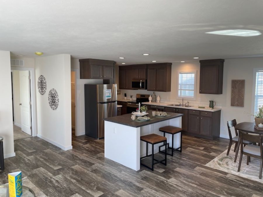 The AURORA/5228-MS049-1 SECT Kitchen. This Manufactured Mobile Home features 3 bedrooms and 2 baths.