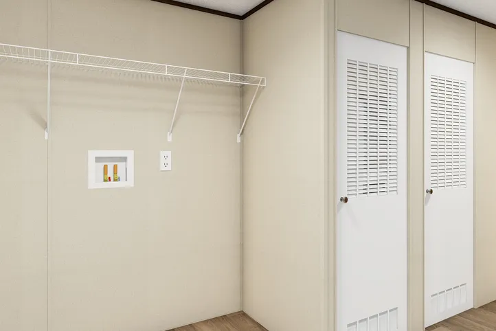 The SATISFACTION Utility Room. This Manufactured Mobile Home features 3 bedrooms and 2 baths.