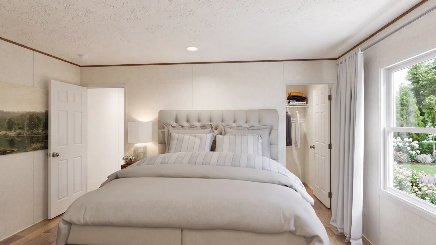 The BIRCH Primary Bedroom. This Manufactured Mobile Home features 3 bedrooms and 2 baths.