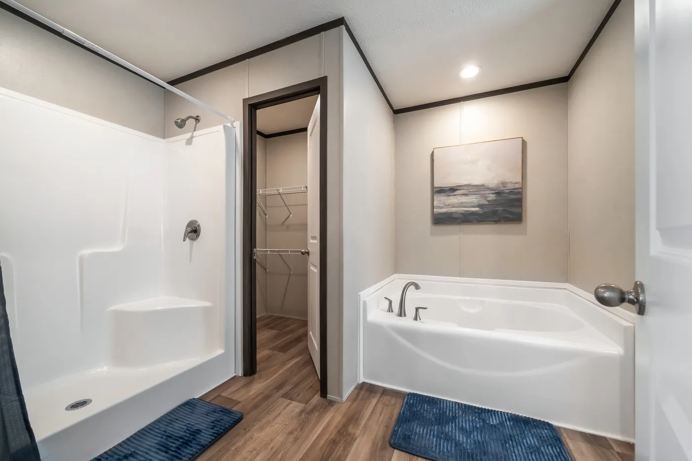 The DYNAMIC Primary Bathroom. This Manufactured Mobile Home features 3 bedrooms and 2 baths.