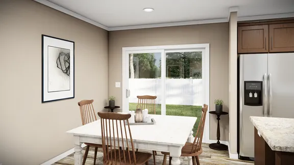 The THE LLOYD II Dining Area. This Manufactured Mobile Home features 3 bedrooms and 2 baths.