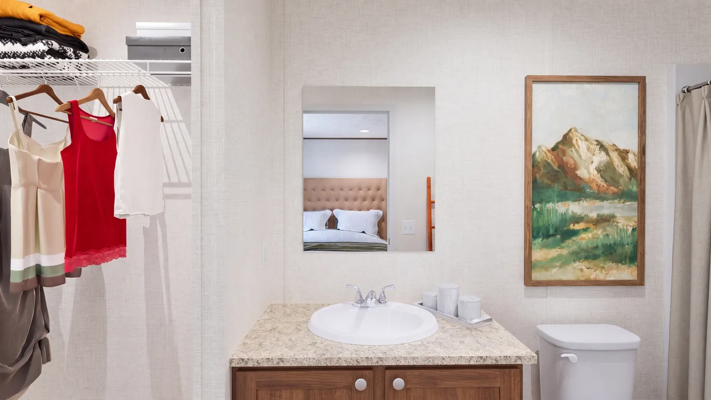 The DOGWOOD Primary Bathroom. This Manufactured Mobile Home features 2 bedrooms and 2 baths.