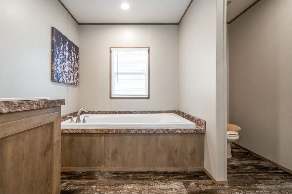 The BELLA VISTA Exterior. This Manufactured Mobile Home features 3 bedrooms and 2 baths.