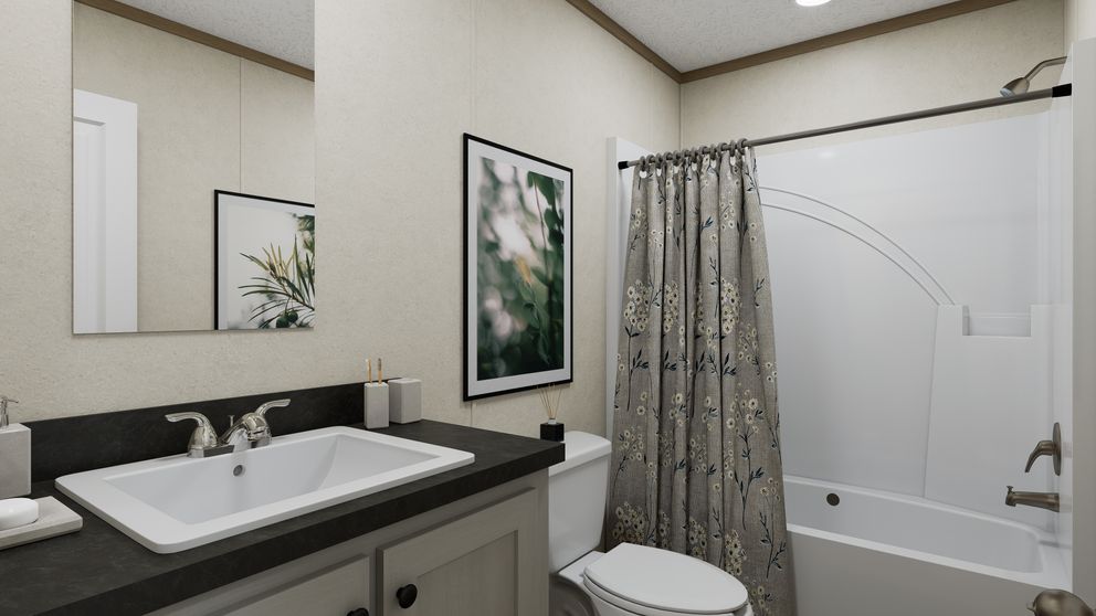 The 4814-CC04 RESOLVE 48 Primary Bathroom. This Manufactured Mobile Home features 2 bedrooms and 1 bath.