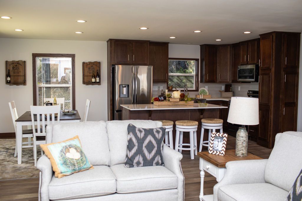 The LEGEND 76-4 Living Room. This Manufactured Mobile Home features 3 bedrooms and 2 baths.