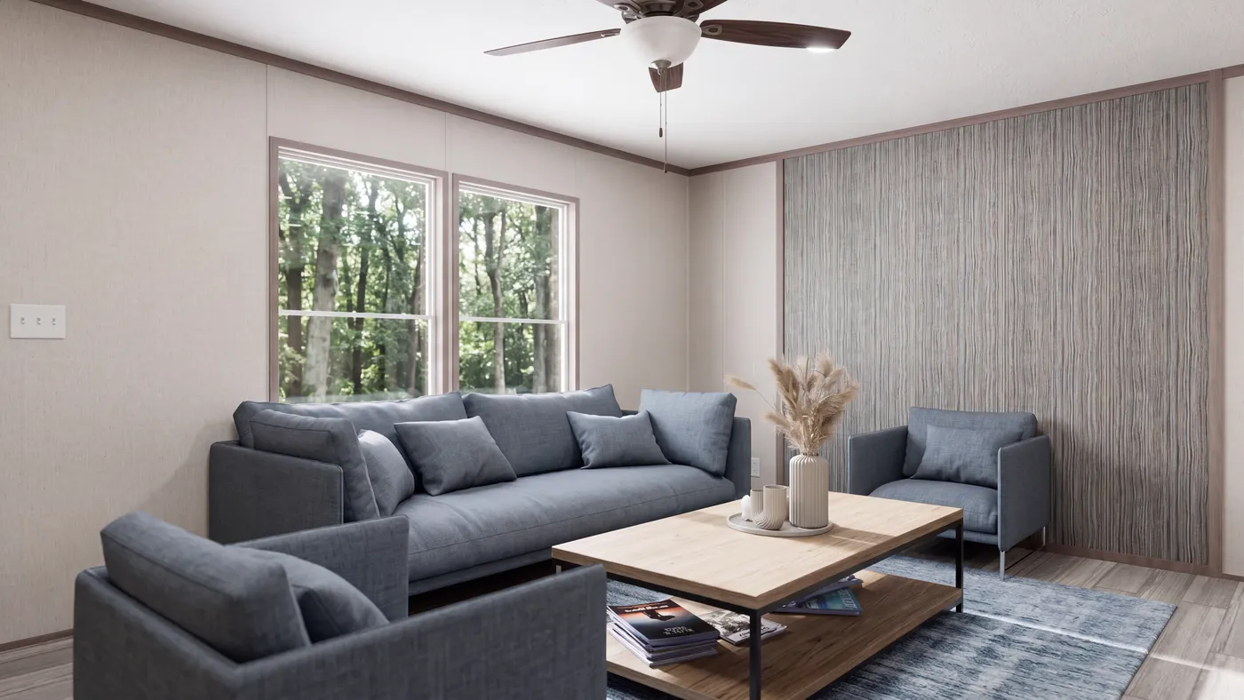 The THE MOUNTAINEER 60 Living Room. This Manufactured Mobile Home features 3 bedrooms and 2 baths.