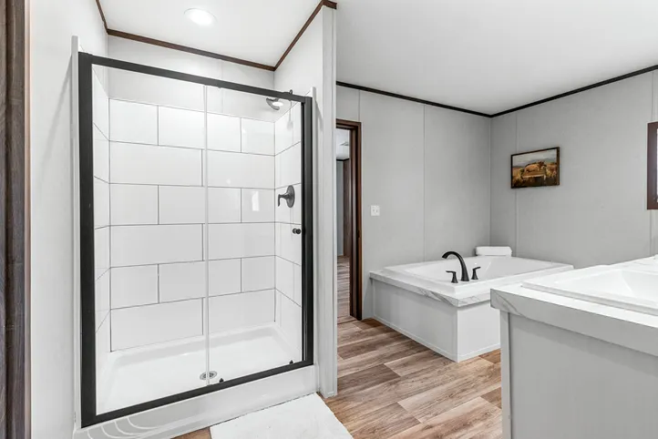 The THE ANNIVERSARY 2.1 Primary Bathroom. This Manufactured Mobile Home features 3 bedrooms and 2 baths.
