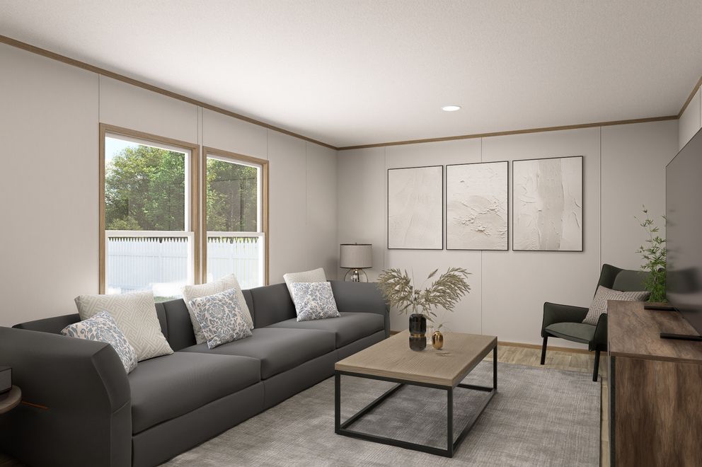 The THE EAGLE 60 Den. This Manufactured Mobile Home features 3 bedrooms and 2 baths.