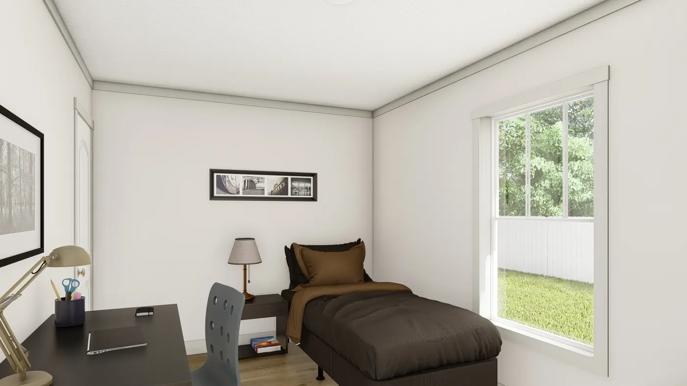 The 1676 SWEET CAROLINE Guest Bedroom. This Manufactured Mobile Home features 3 bedrooms and 2 baths.